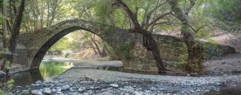 Panorama of Tzelefos single arch stone bridge in Paphos forest. The bridge was built during the Venetian period on Cyprus (1489-1571)